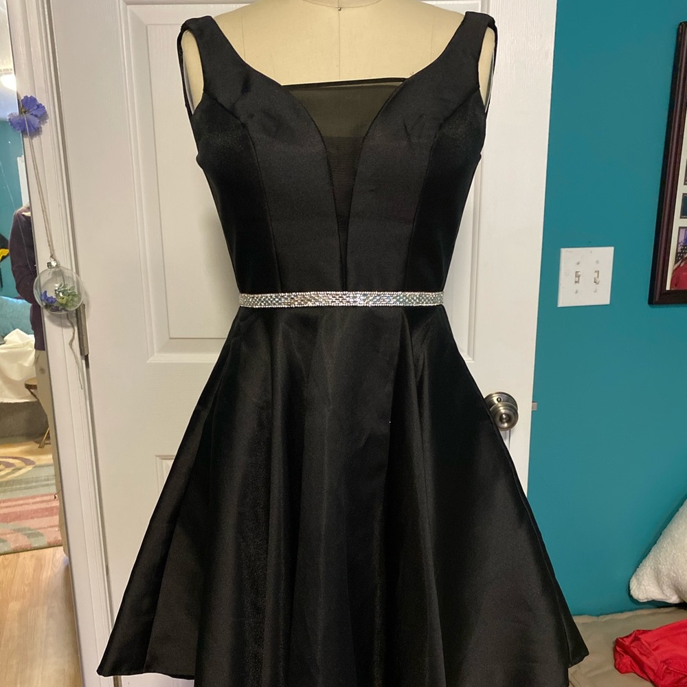Short Black cocktail dress with flared skirt